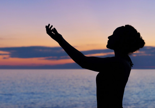 Woman with her hands up 